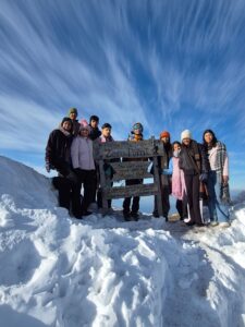 group of people at khaliya top zero point munsyari